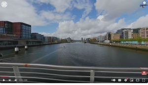 Photo of the river Liffey in Dublin viewed from one of the bridges