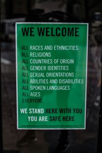 Poster stating that all are welcome.