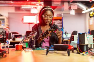 Woman using electrical equipment